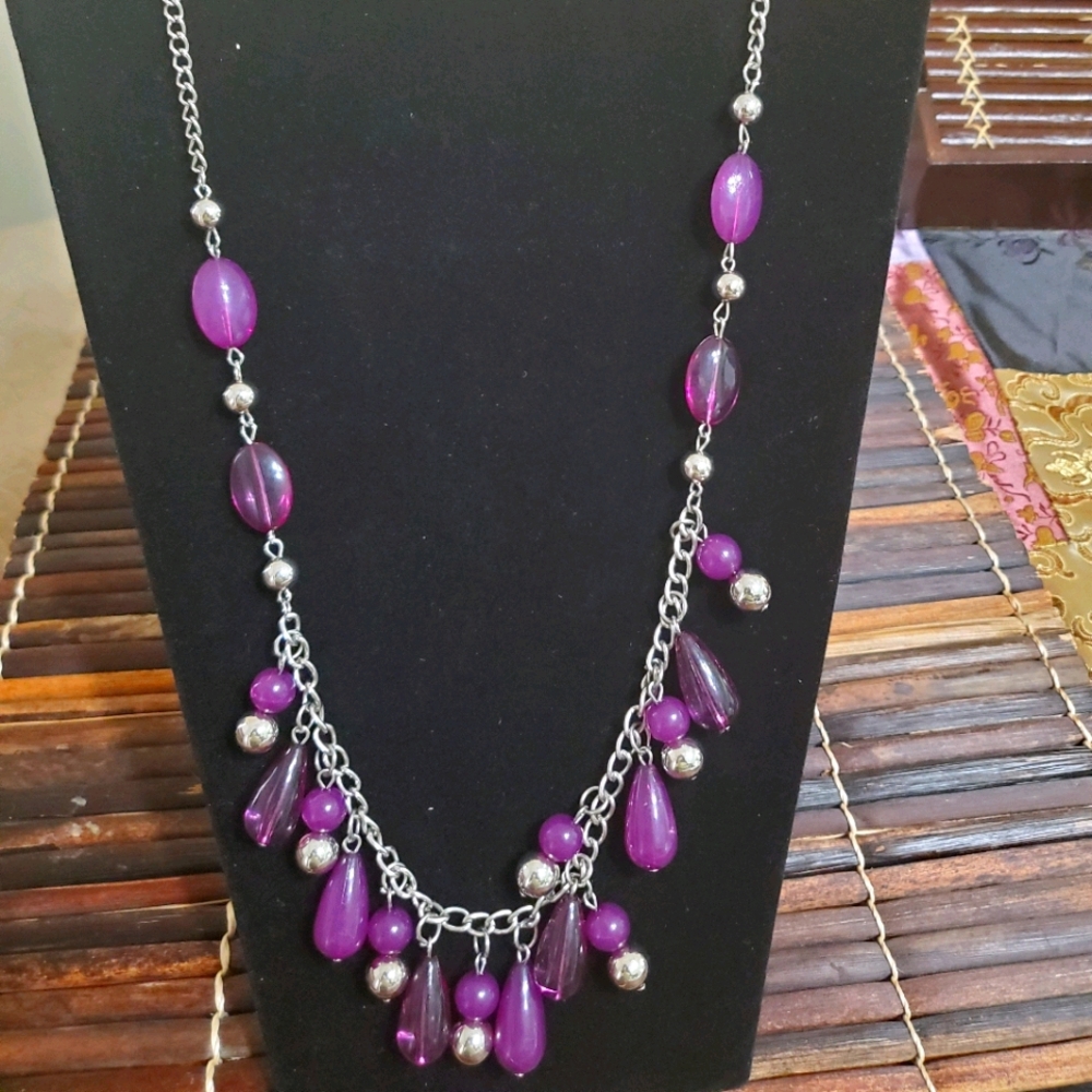 Beautiful purple low hanging necklace